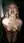 Nude blonde kneeling in shower