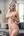 Platinum blonde nude in living room