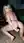 Nude blonde on rug with plug