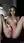 Brunette spreads wide in office chair