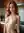 Redhead topless in bright kitchen