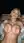 Blonde squeezing big tits on bench