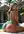 Blonde in teal bikini poolside