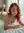 Redhead lying nude on stomach