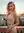 Pink hair balcony sunset tease