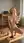 Blonde blue eyes rides dildo in study