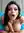 Priya in blue bikini on wooden deck