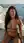 Curvy latina in tiny bikini on rooftop