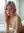 Pink hair nude hotel bed