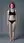 Redhead in black sports bra studio pose