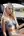 Blonde lingerie glance from car seat