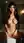 Young Latina spreads on marble counter