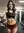 Gym mirror selfie in sports bra