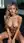 Blonde nude on velvet couch