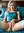 Hedvig in Teal Satin and White Stockings on the Bed
