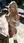 Curvy blonde pulls shirt open poolside