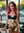 Redhead in lace at cafe table