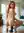 Early 20s redhead rides thick dildo