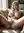 Blonde fingers shaved pussy on couch