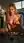 Curvy blonde rides floor dildo