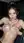 Brunette topless in car backseat