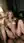 Nude blonde on mattress, legs held open