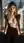 Nude blonde in city window
