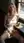 Blonde fingers wet pussy at cafe table