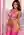 Zoe in shiny hot pink latex bodysuit