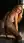 Nude blonde on all fours marble floor