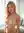 Early 20s pink hair topless living room