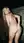 Nude blonde spreads ass outdoors