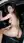 Brunette waves nude in car