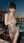 Sheer bodysuit rooftop pose