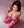 Zoe in hot pink latex bodysuit