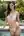 Young adult by infinity pool