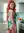 Fiery redhead over-shoulder kitchen glance