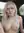 Platinum blonde topless in car