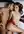 Cowgirl on oiled skin in studio