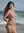 Young adult nude beach pose