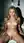 Blonde nude on bathroom tub edge