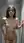 Brunette nude in tiled shower