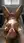 Nude blonde on kitchen counter