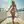 Jennifer in yellow bikini at rooftop pool