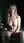 Young adult blonde nude in bedroom