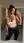 Curvy brunette mirror selfie in locker room