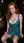 Curvy redhead on bar stool