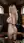 Nude blonde in wooden sauna