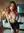 Redhead topless in black skirt