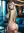 Nude curvy blonde living room glance